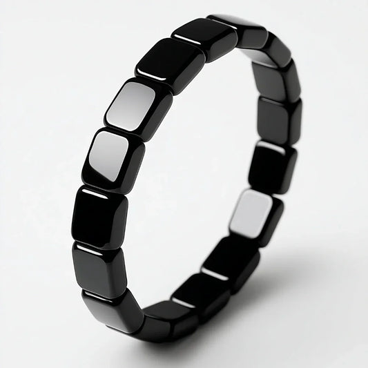 Detalle de pulsera de hematita negra masculina Hora Paris