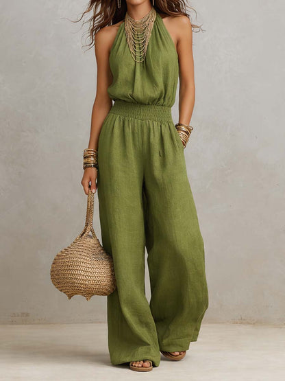Mono mujer de espalda descubierta con escote halter y pierna ancha