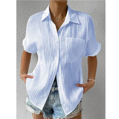Novedad: 50 % DE DESCUENTO Camisa con cuello informal, abotonada y holgada