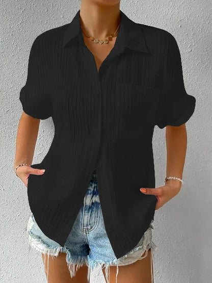 Novedad: 50 % DE DESCUENTO Camisa con cuello informal, abotonada y holgada