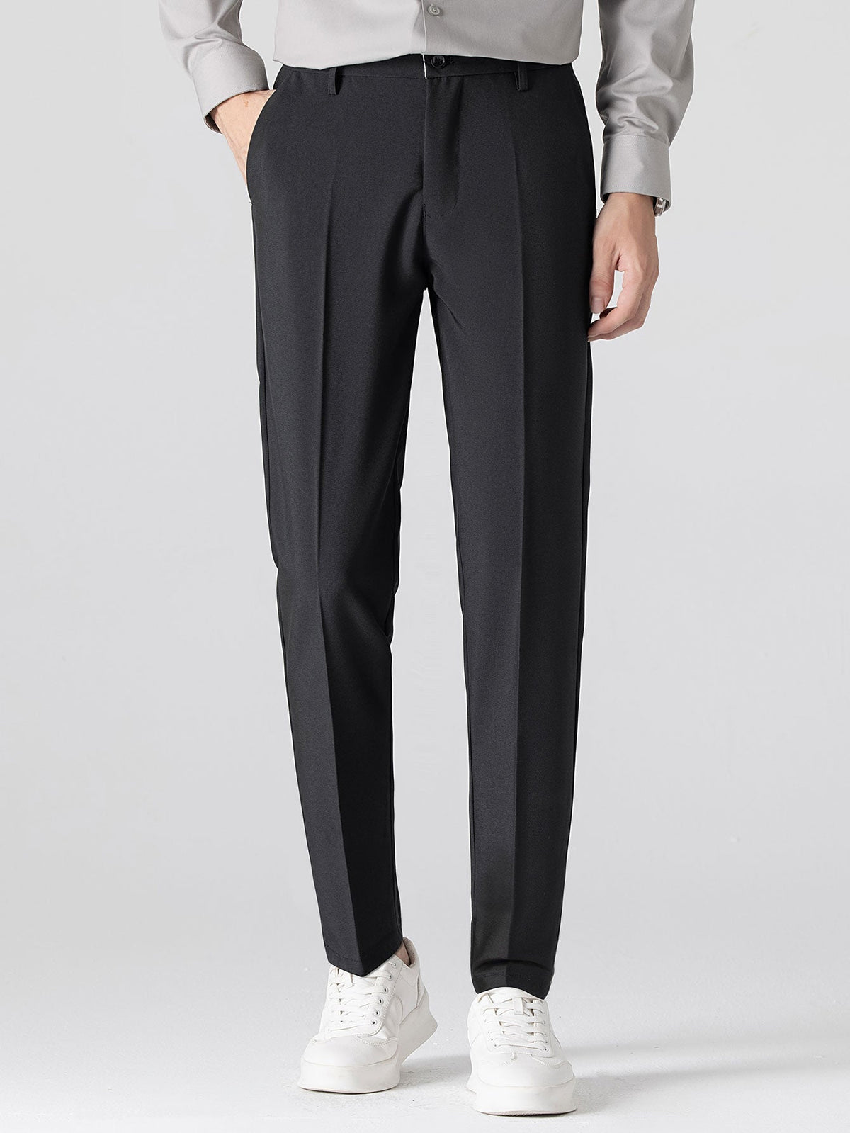 Conjunto polo jacquard y pantalón cónico