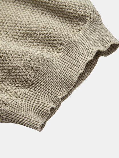 Polo de punto con cremallera texturizada