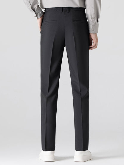 Conjunto polo jacquard y pantalón cónico