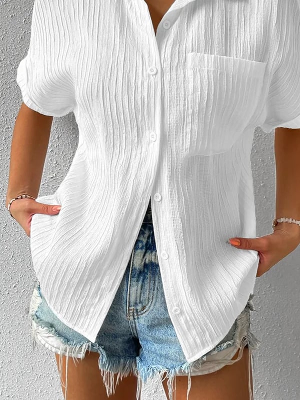 Novedad: 50 % DE DESCUENTO Camisa con cuello informal, abotonada y holgada