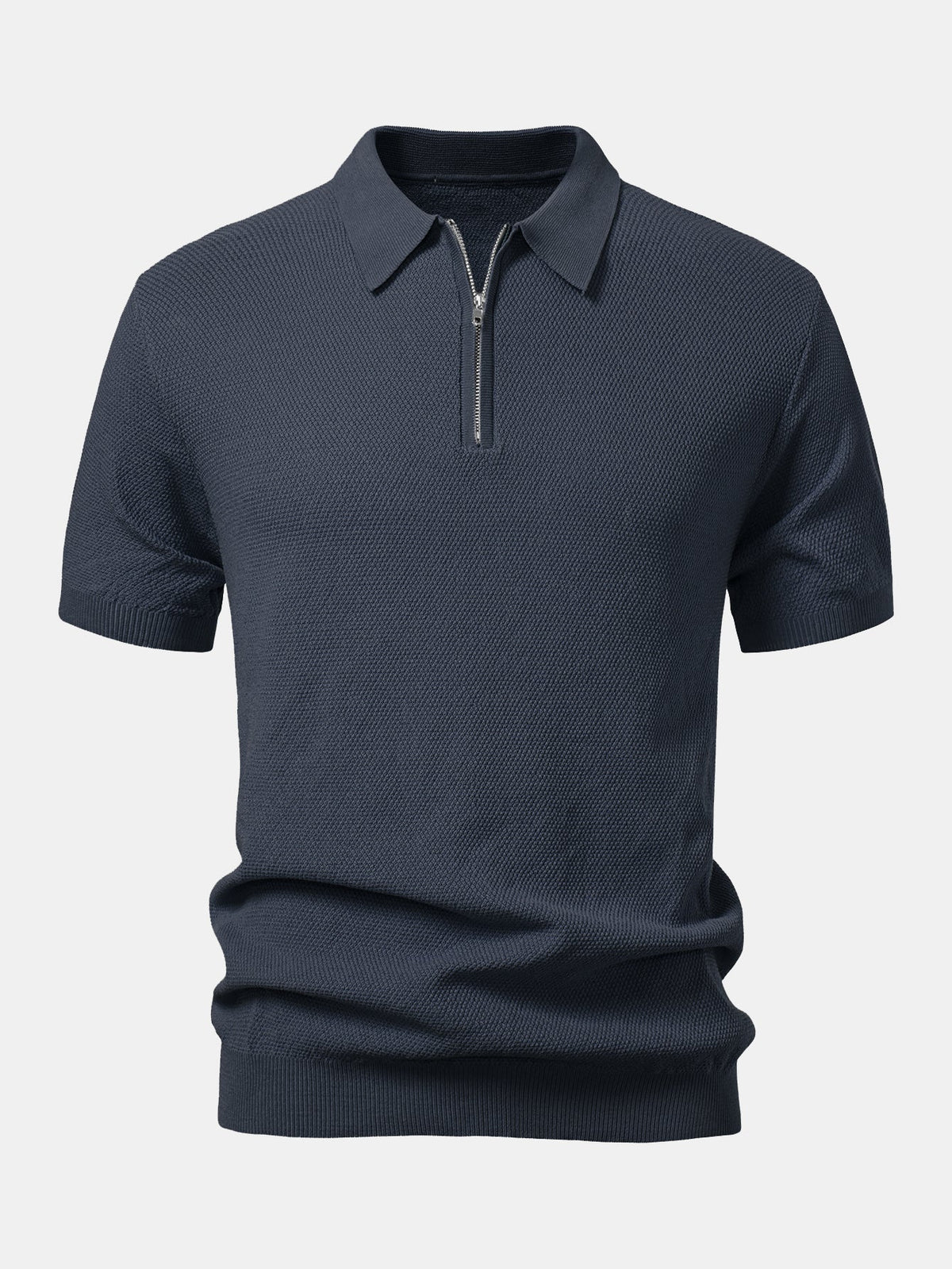 Polo de punto con cremallera texturizada