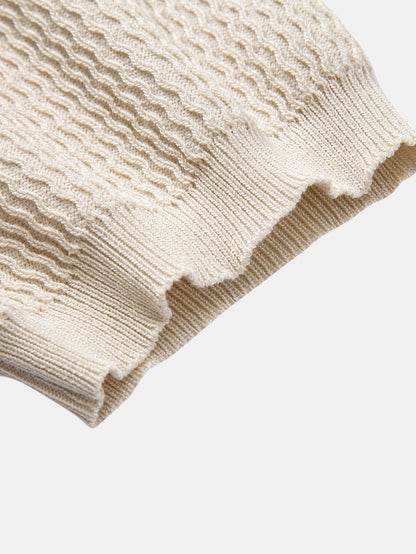 Conjunto polo jacquard y pantalón cónico