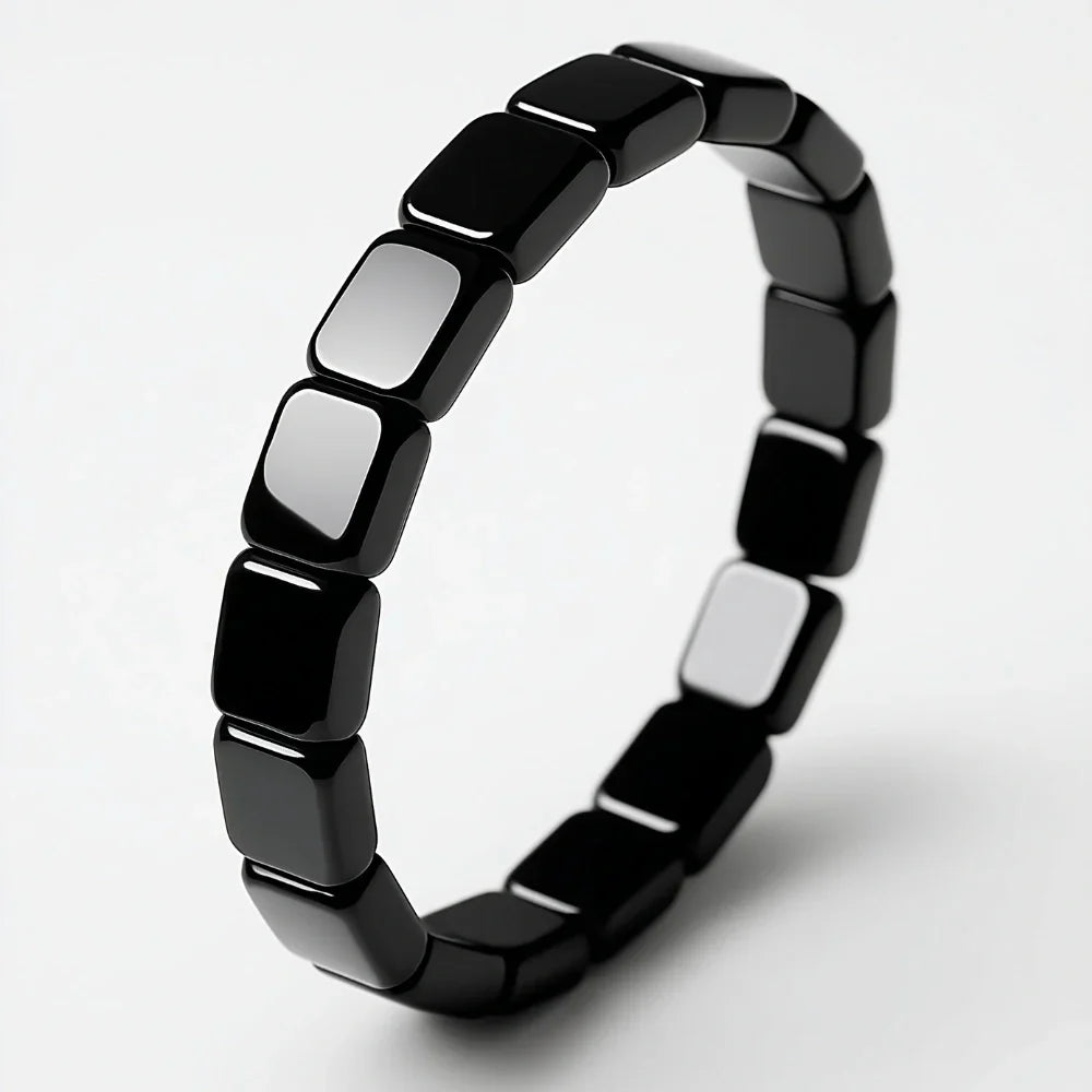 Detalle de pulsera de hematita negra masculina Hora Paris