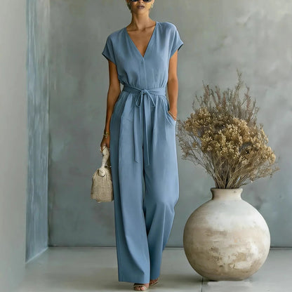 Mono mujer con escote en V cinturón y pantalón ancho casual chic