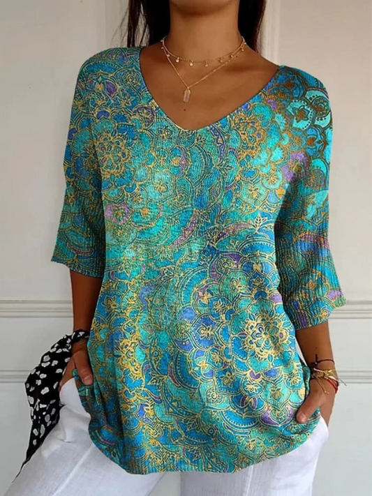 Blusa mujer estampada escote V fluida – estilo bohemio elegante
