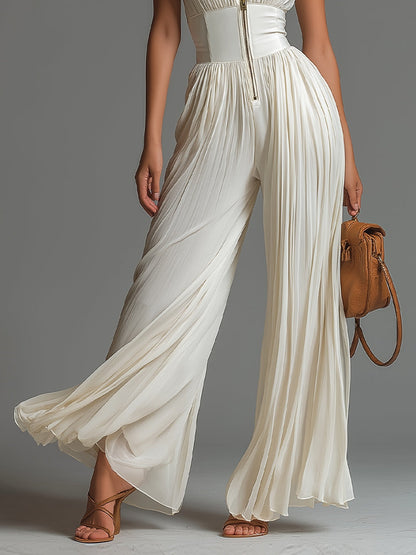 Mono mujer elegante plisado con piernas anchas