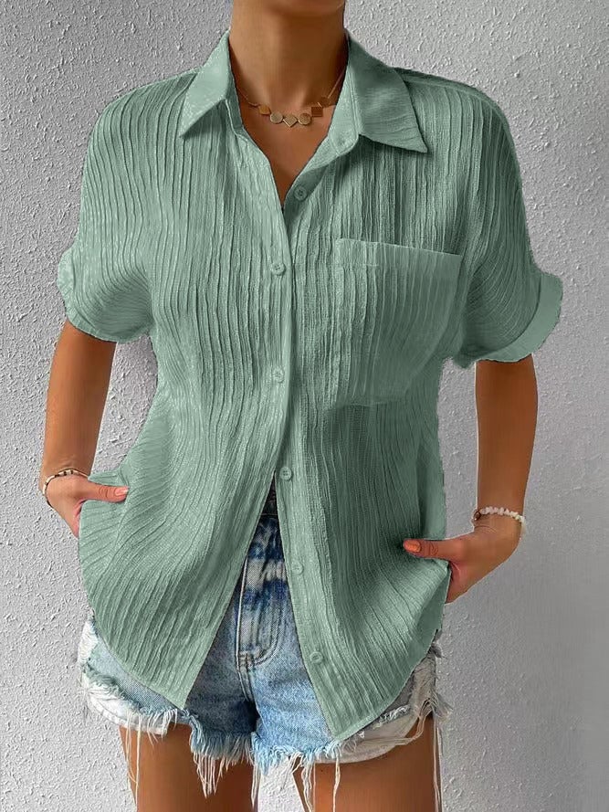 Novedad: 50 % DE DESCUENTO Camisa con cuello informal, abotonada y holgada