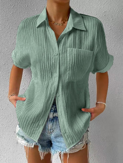 Novedad: 50 % DE DESCUENTO Camisa con cuello informal, abotonada y holgada