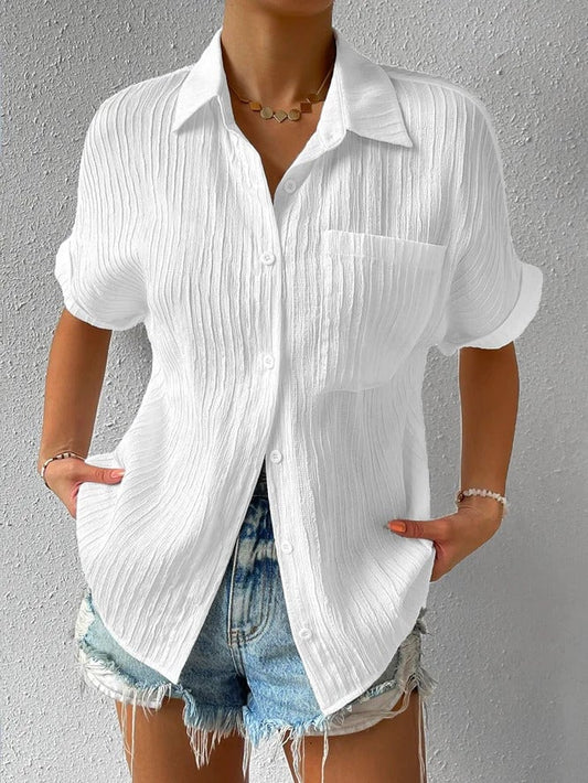 Novedad: 50 % DE DESCUENTO Camisa con cuello informal, abotonada y holgada