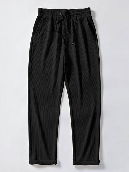 Conjunto polo jacquard y pantalón recto