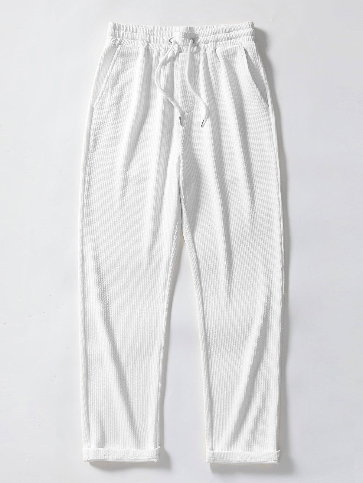 Conjunto polo jacquard y pantalón recto