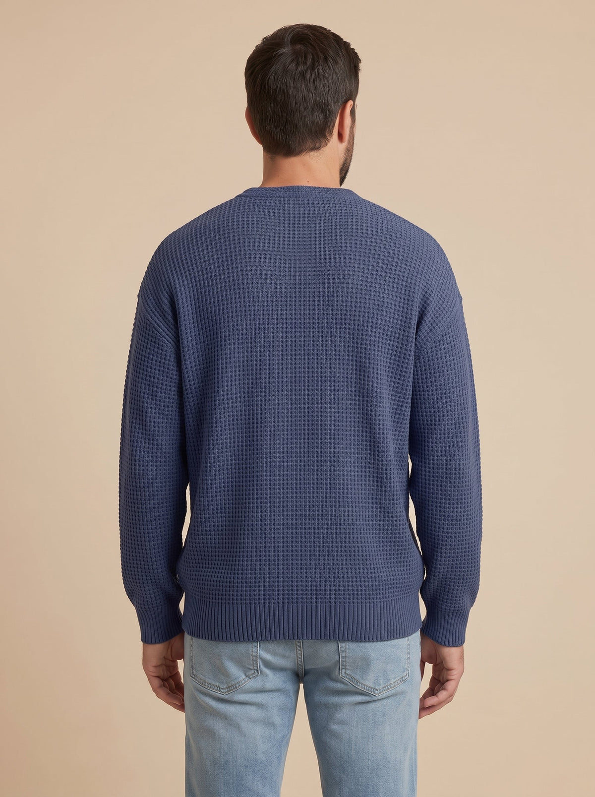 Milo jersey de punto con relieve azul marino, de espaldas