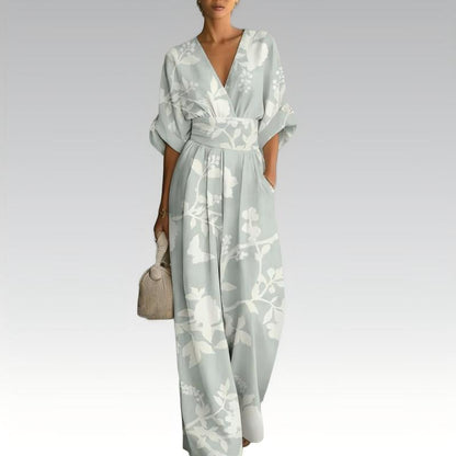 Mono mujer floral con cintura marcada y escote en V verano