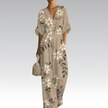 Mono mujer floral con cintura marcada y escote en V verano