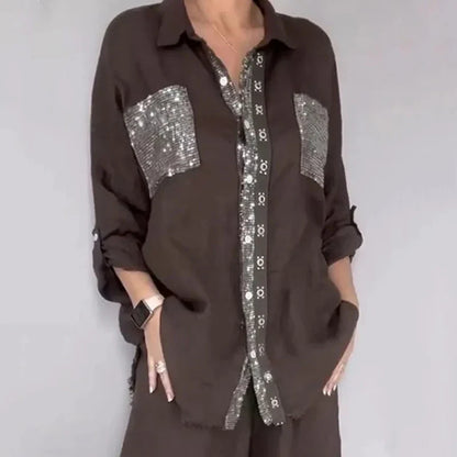 Conjunto de mujer con blusa fluida y pantalón con lentejuelas